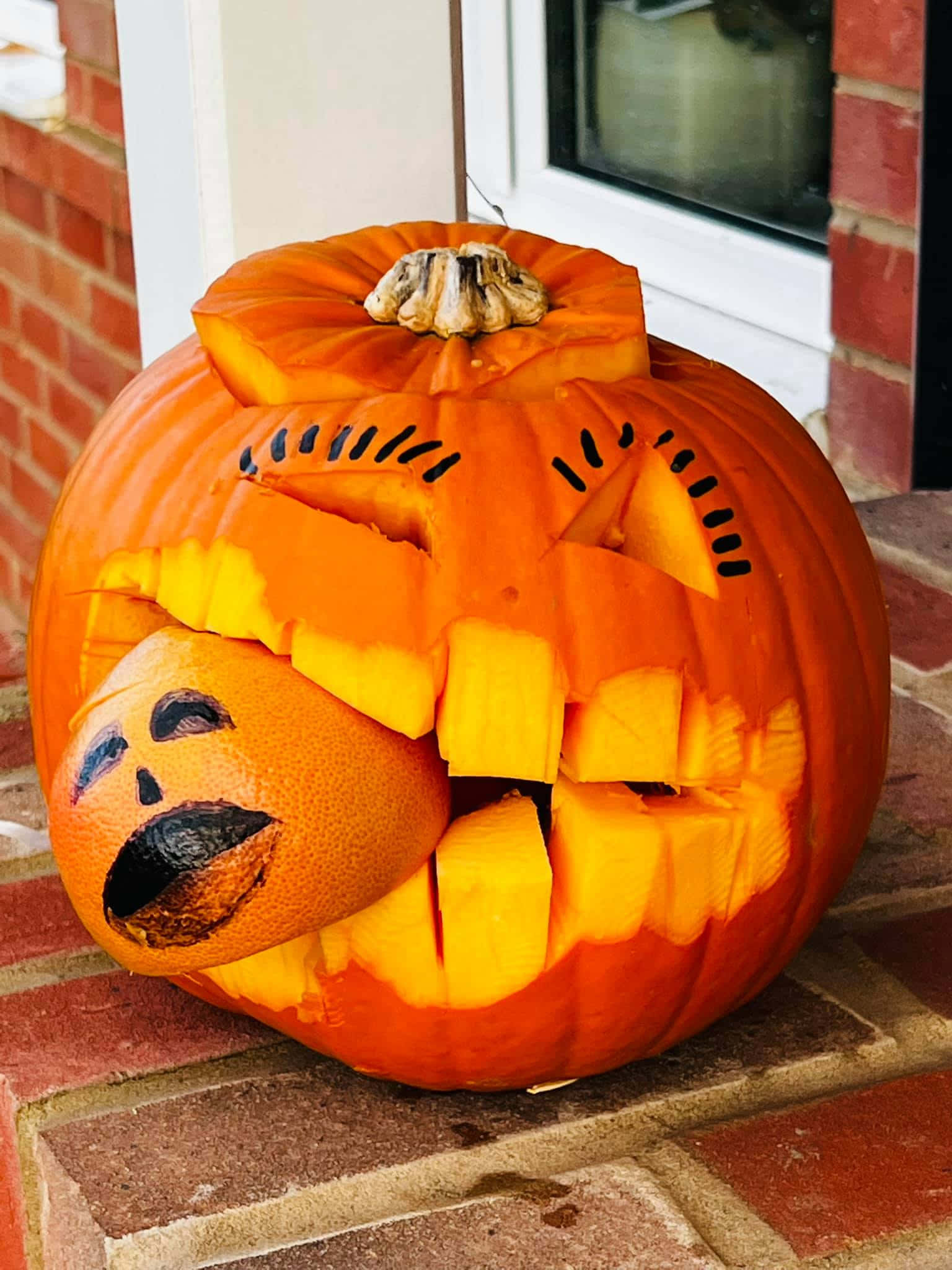 Φωτεινή κολοκύθα του Halloween με τρομακτικό τέρας Ταπετσαρία
