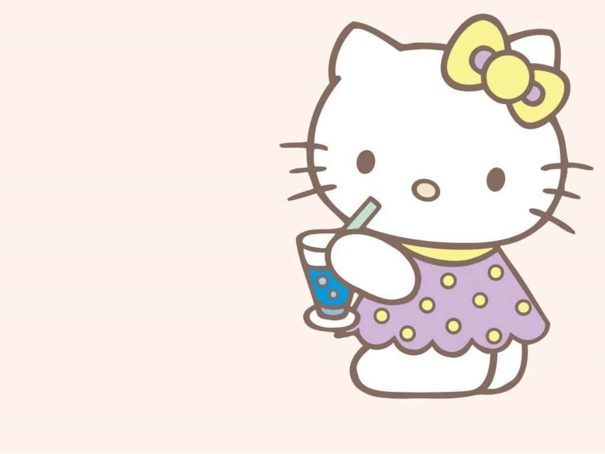 Hello Kitty με Ποτό σε Laptop Ταπετσαρία