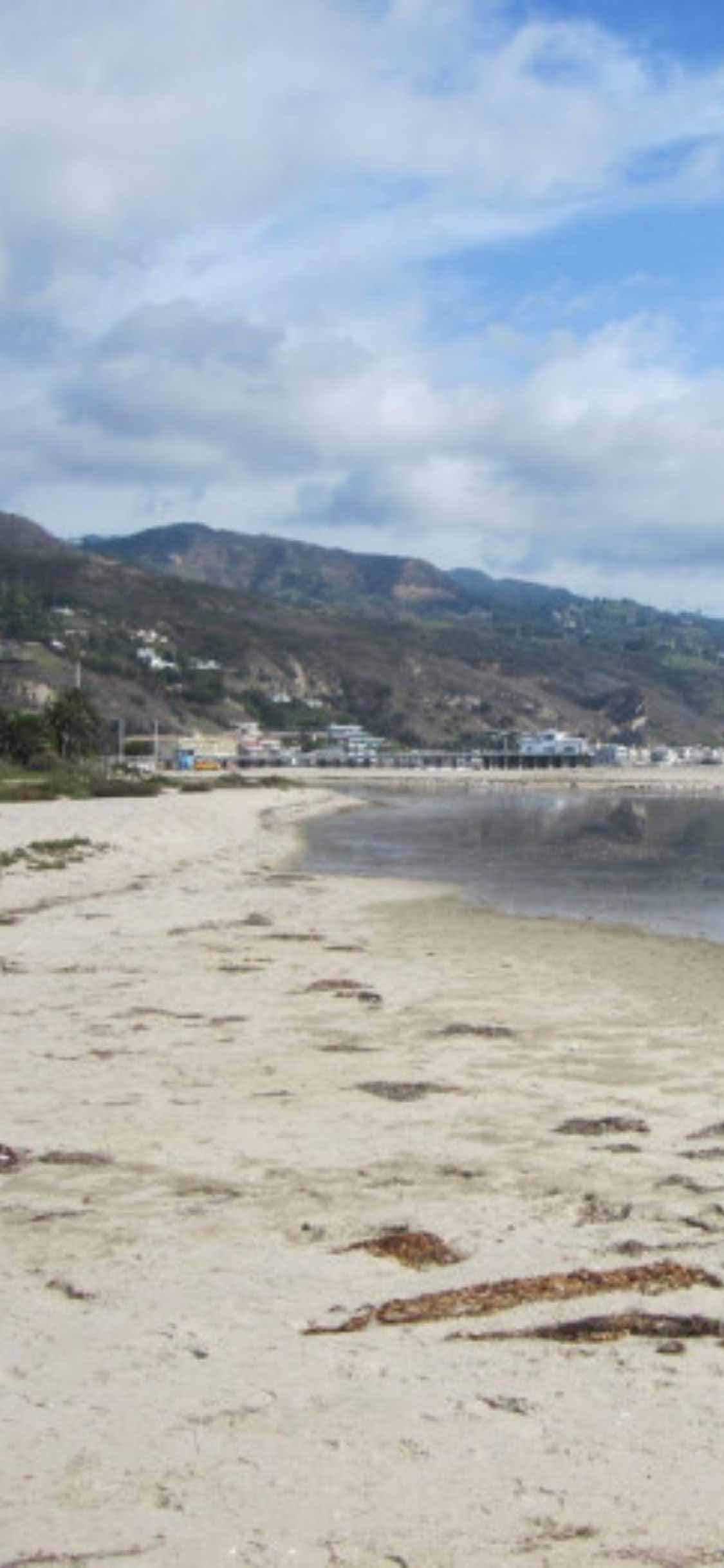 Απολαύστε γραφικές εικόνες του Malibu από το iPhone XS σας Ταπετσαρία