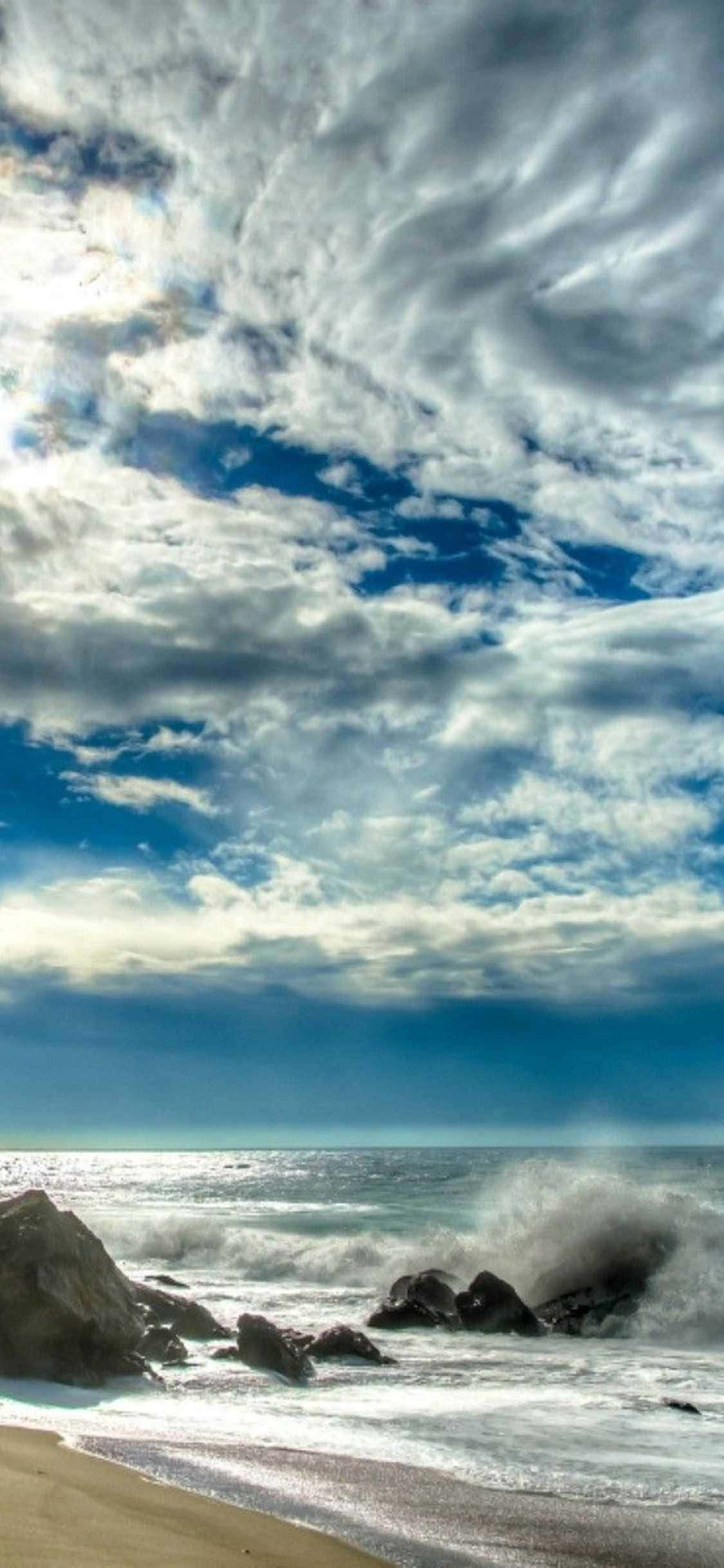 "Αποτυπώστε τα χρυσά ηλιοβασιλέματα του Malibu στο iPhone Xs σας!" Ταπετσαρία