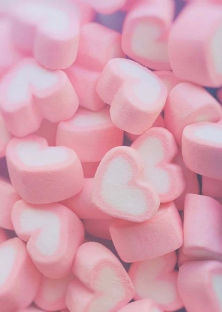 ροζ marshmallows σε έναν σωρό σε λευκό φόντο Ταπετσαρία
