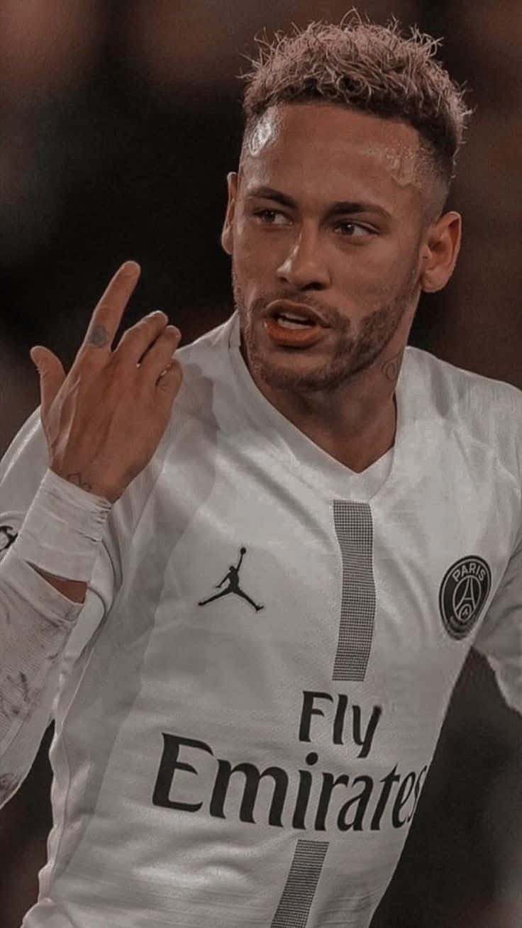 Ο Neymar Jr. κάνει ντρίμπλα με μια μπάλα ποδοσφαίρου. Ταπετσαρία