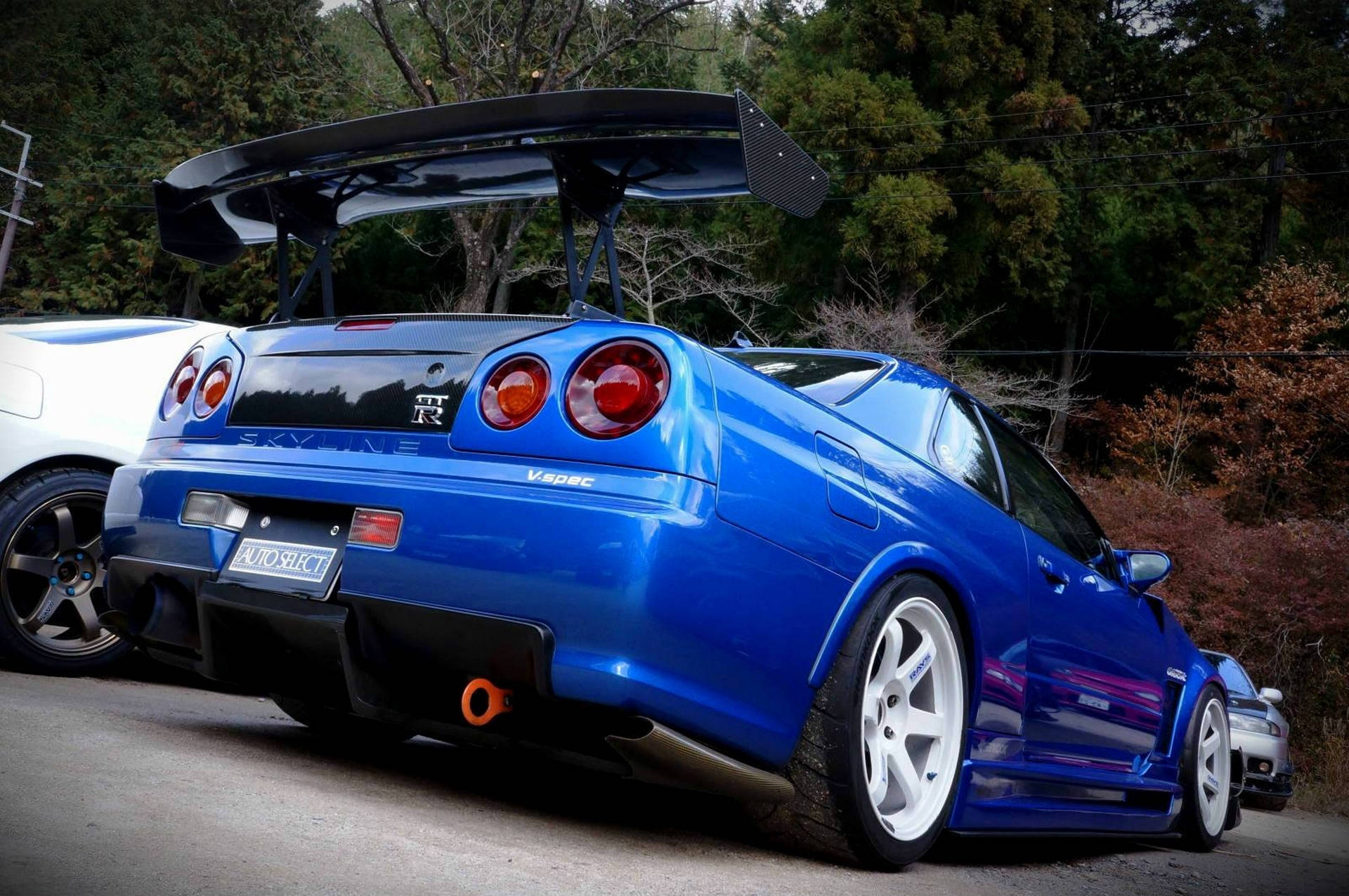 Επιβλητική λήψη ενός Nissan Skyline GTR R34 σε υψηλή ευκρίνεια. Ταπετσαρία