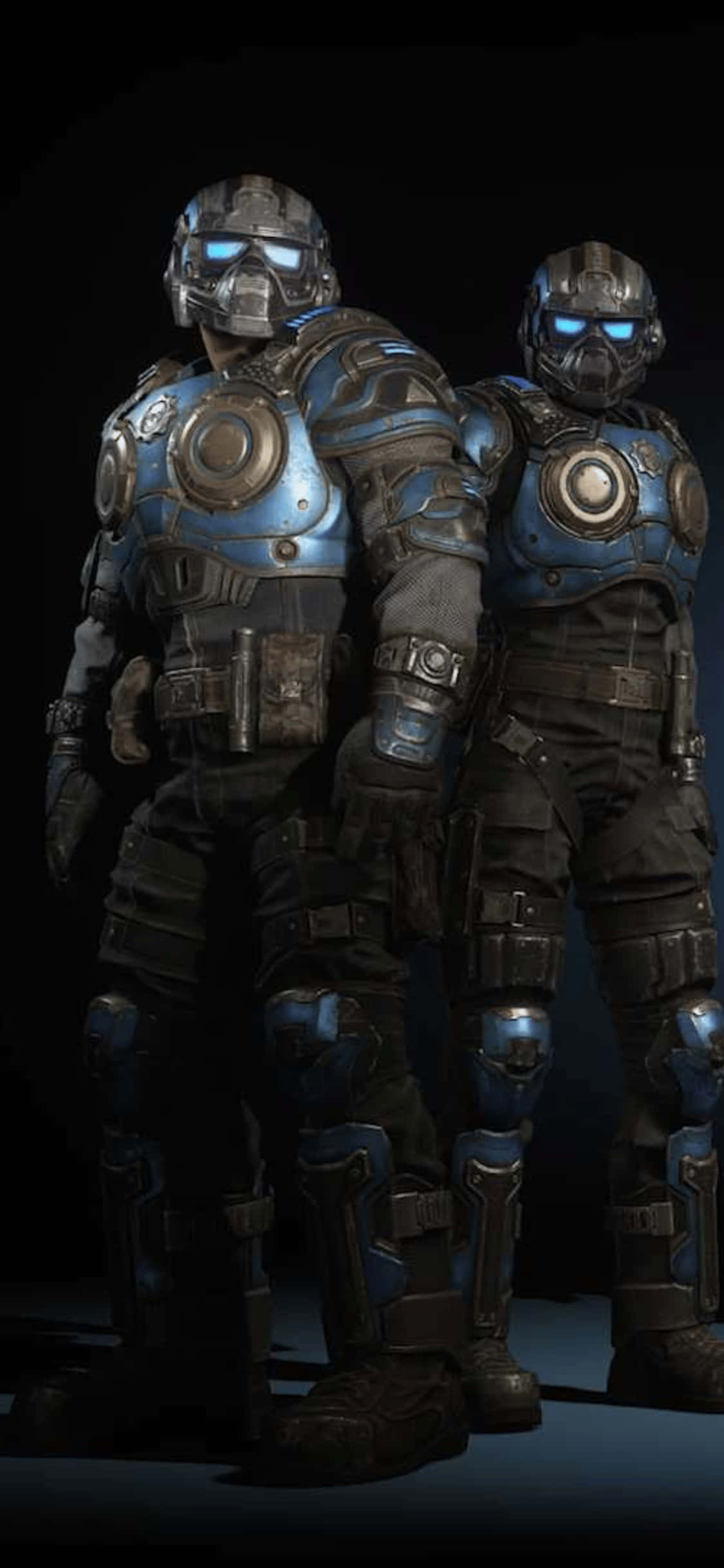 δύο άντρες με μπλε στολές gears of war στέκονται ο ένας δίπλα στον άλλο Ταπετσαρία