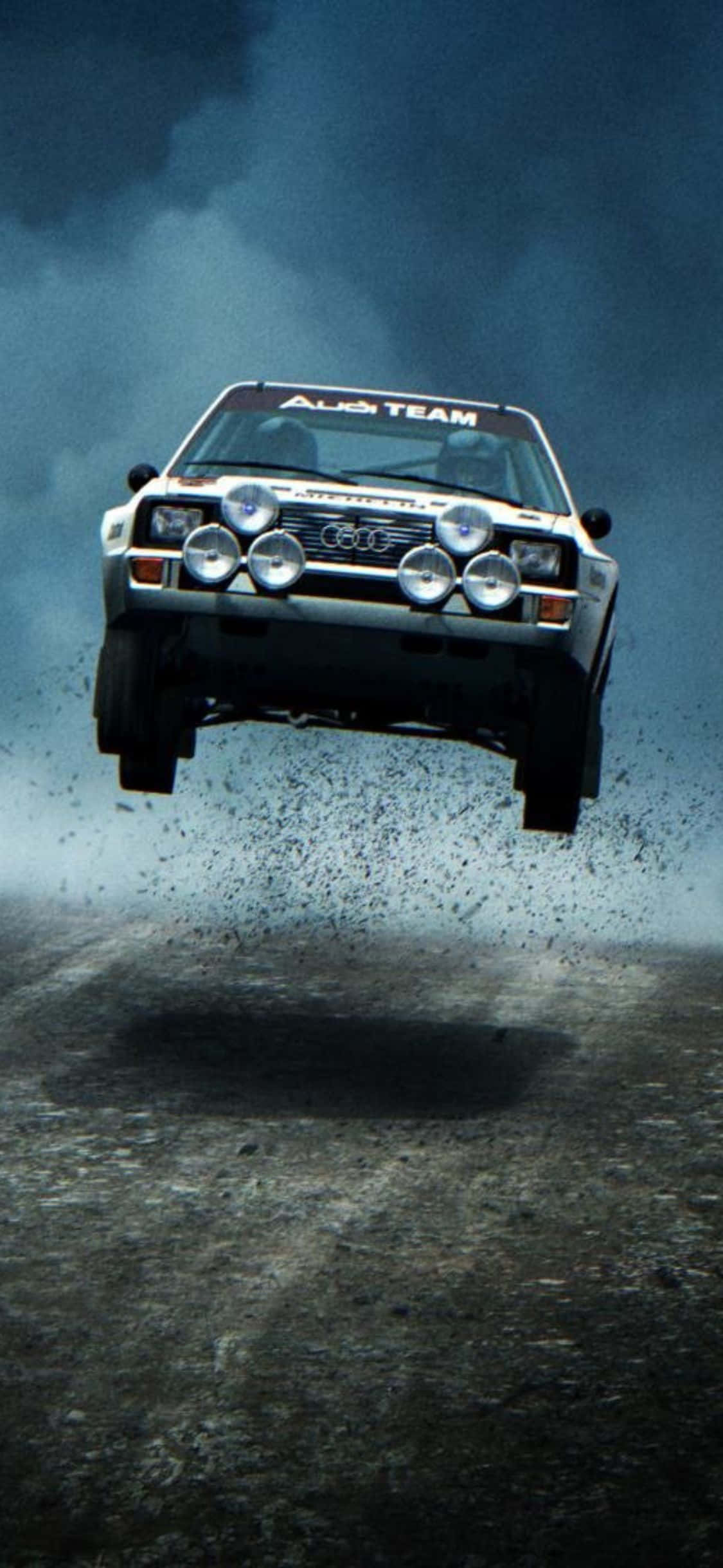 Νιώστε την Έκρηξη Ενθουσιασμού με το iPhone Xs Dirt Rally Ταπετσαρία