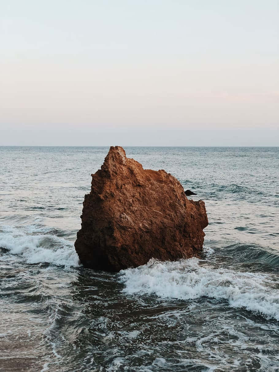 Φόντο iPhone X Malibu με Μεγάλη Πέτρα Ταπετσαρία