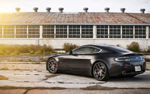 Aston Martin Vanquish εν δράσει σε γραφικό δρόμο — Steam Deck OLED Ταπετσαρία