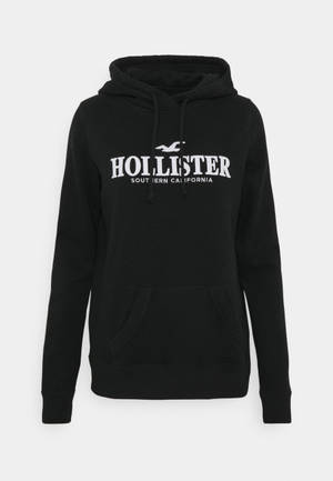Ταπετσαρία μινιμαλιστικού μαύρου φούτερ Hollister — Καθαρό Ταπετσαρία