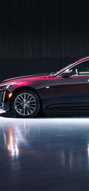 Ταπετσαρία γυαλιστερού κόκκινου Cadillac από iPhone — iPhone 15 Pro Ταπετσαρία