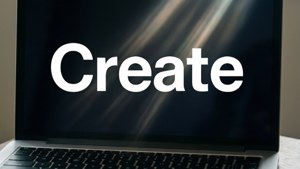 Μια μινιμαλιστική ταπετσαρία MacBook με τη λέξη 'Create' έντονα γραμμένη.