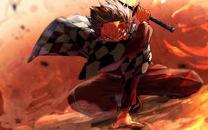 Ταπετσαρία Demon Slayer του Kamado Tanjiro περιτριγυρισμένου από καπνό και φωτιά.