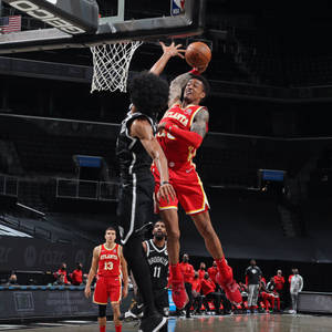 John Collins With The Opponent Team wallpaper — Motorola Razr 2025 Ταπετσαρία